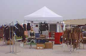 Tent with leather goods.