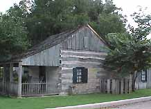 Log and Stone House