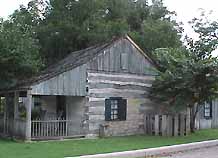 Log and Stone House